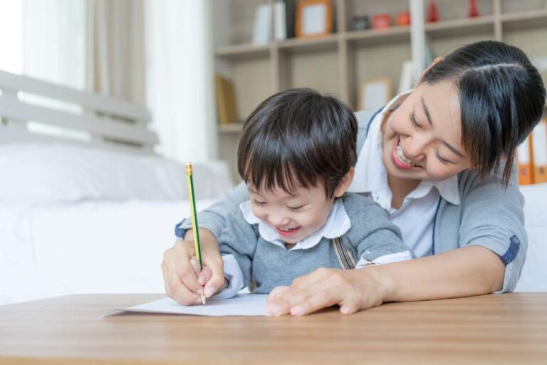 A student learning from a teacher at an international school in Penang