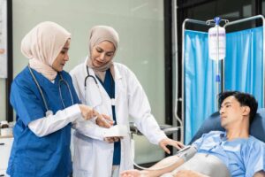 oncologist doctors visiting a patient